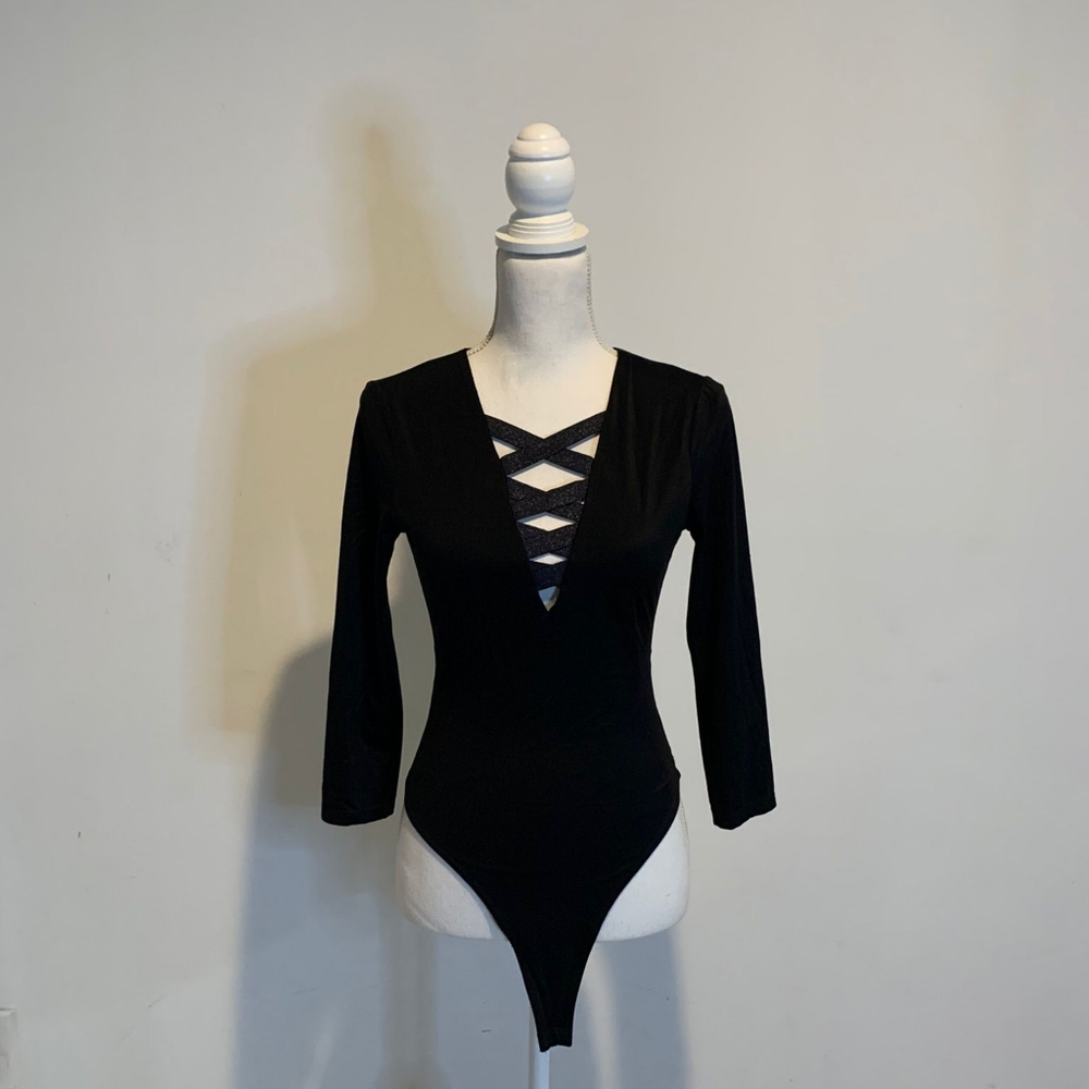 Victoria's Secret Cross front black body suit. Size S